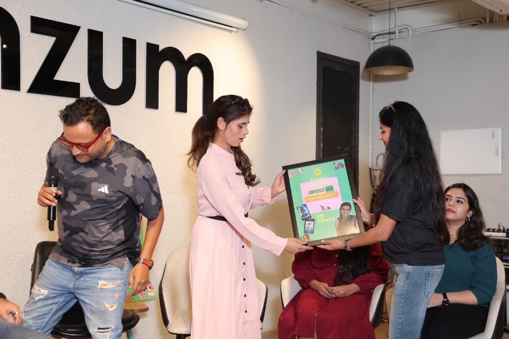 PB Flower receiving framed Booknerds Hangout award